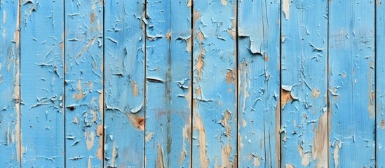 Leinwandbilder - Texture of a blue plywood wall with peeling paint creating a rustic look providing a suitable background for a copy space image