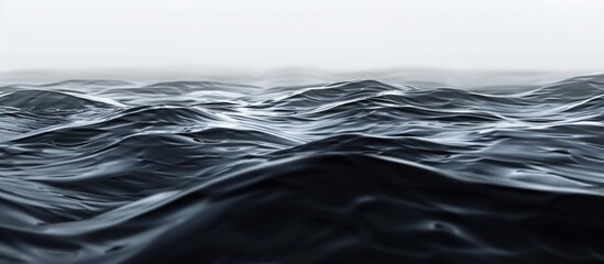 Leinwandbilder - Image featuring black water surface with waving ripples providing copy space image