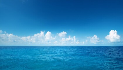 Wall Mural - azure ocean and fluffy clouds on a sunny day