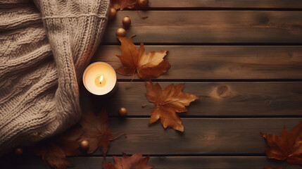 Wall Mural - Flat lay with fabric draping, fallen leaves and beautiful candle on wooden tabletop