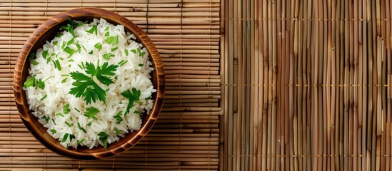 Poster - Top view of appetizing boiled rice bowls garnished with parsley on a bamboo mat suitable for adding text in the copy space image