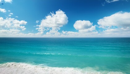 Wall Mural - azure ocean and fluffy clouds on a sunny day