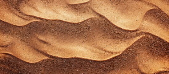 Fototapete - Brown sand with a textured appearance creates an abstract background suitable for a copy space image