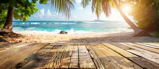 Sticker - Wooden table featuring a sunny tropical beach background blurred to enhance focus ideal for showcasing summer products and presentations with copy space image