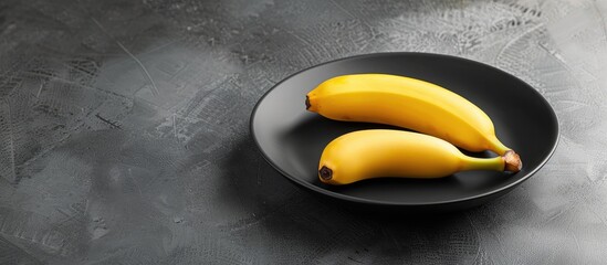 Wall Mural - Steamed bananas served on a plate with copy space image