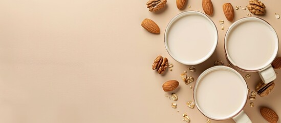 Poster - Cedar nut milk on a beige table background A non dairy milk alternative A concept for healthy vegetarian food and beverages Copy space top view