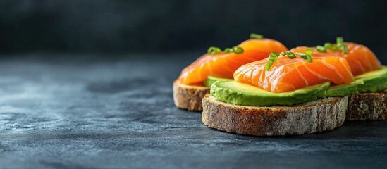 Fototapete - toast with avocado and fresh salmon. with copy space image. Place for adding text or design