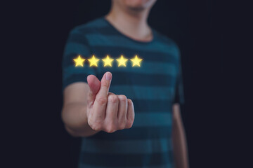 Customer service evaluation concept, Man hand shaped mini heart to five star