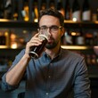 © Gleb - man drinking beer in bar