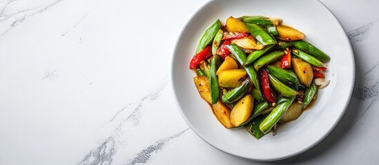 Leinwandbilder - Stir fried bitter gourd served on a white ceramic plate. with copy space image. Place for adding text or design