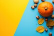 © Nico - Pumpkin, Nuts, and Autumn Leaves on a Blue and Yellow Background