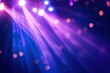 © PrusarooYakk - Vibrant concert stage lights creating a festive atmosphere with colorful beams and bokeh effects, perfect for events and entertainment themes.