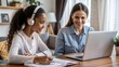 © Dushan - smiling woman in earphones sit at desk at home