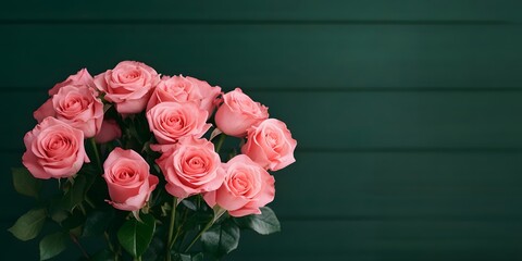 Wall Mural - A bouquet of pink roses is displayed on a black background. The roses are arranged in a way that they are all facing the same direction, creating a sense of unity and harmony