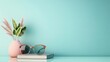 © kinara art design - A serene workspace featuring sunglasses, a book, and a decorative plant in a pastel setting.