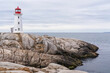 © Designpics - Peggy's Cove Lighthouse on a moody day in Nova Scotia on the Atlantic coast of Canada; Peggy's Cove, Nova Scotia, Canada