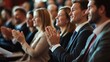 © fotofabrika - Audience applauding at a business conference in a modern venue during a networking event in the afternoon