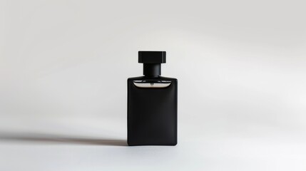 A minimalist black bottle is placed against a bright, neutral background, creating a stark contrast that emphasizes the modern and sophisticated design.