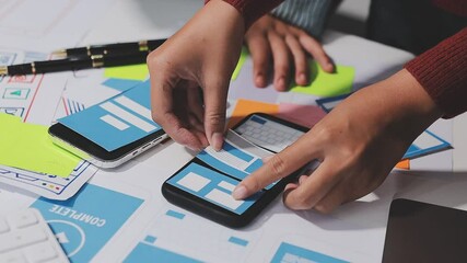 The designer team is designing the uxui system to make the uxui system work well on new phones and support system updates. Website development concept UI UX front end designer