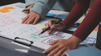 The designer team is designing the uxui system to make the uxui system work well on new phones and support system updates. Website development concept UI UX front end designer