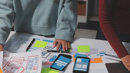 The designer team is designing the uxui system to make the uxui system work well on new phones and support system updates. Website development concept UI UX front end designer
