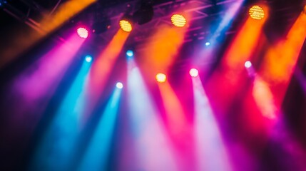 Poster - A vibrant stage lit with multicolored lights creating a dazzling background effect.