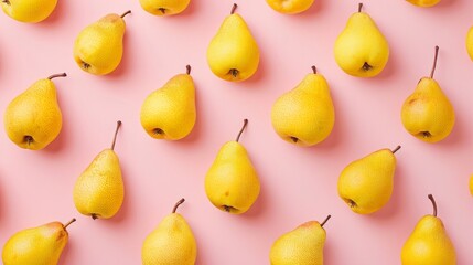 Trendy fruit pattern made of yellow pears and apples on light pastel pink background. Minimal layout. Nature summer concept. 