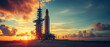 © Prasanth - space rocket on launch pad, panoramic shot of the sky and the setting sun in the background.