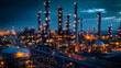 © Prasanth - A petrochemical facility with an oil refinery and tower operating at night.