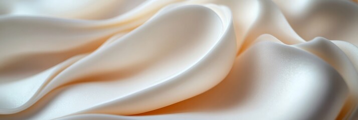 Wall Mural - A close-up, abstract image of a creamy, white substance with soft curves and waves, symbolizing smoothness, purity, luxury, and delicate texture.