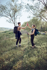 Wall Mural - Two Women Celebrating During Hiking