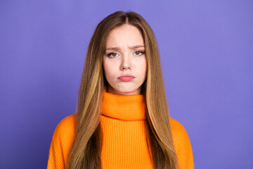 Sticker - Portrait photo of youth charming blonde hair cute unhappy girl keep being sad in orange turtleneck isolated on violet color background