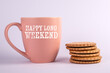 © STOATPHOTO - Happy Long Weekend. Motivational text on a coffee mug