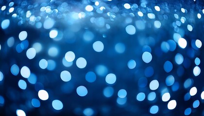 abstract image featuring blue bokeh lights in varying sizes creating a sparkling and vibrant background