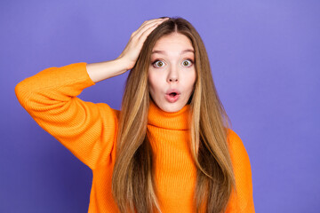 Poster - Portrait photo of youth charming blonde hair cute girl in orange turtleneck oops failed touch head forgot her keys isolated on violet color background