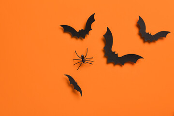 Canvas Print - Paper bats and spider for Halloween party on orange background