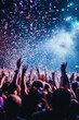© InfiniteStudio - Crowd celebrating at an energetic concert with colorful confetti falling under dazzling lights during a vibrant nighttime event