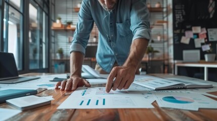 Wall Mural - Marketing specialist, side view, with marketing strategy documents on table in office generative ai