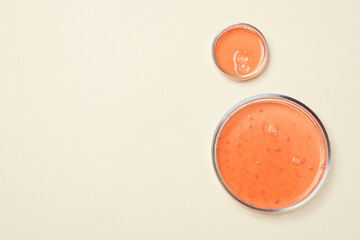 Wall Mural - Petri dishes with samples on beige background, top view. Space for text