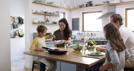 Wall Mural - Food, spaghetti and happy with family eating in kitchen for health, love and together. Smile, lunch and nutrition with parents and children at dining table in home for dinner, wellness and bonding