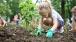 © BOJOShop - Young Girl Planting Trees in a Garden