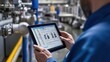 © suphamit - Technician using a tablet to assess oxygen levels in the water at a wastewater treatment facility