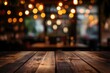 © Dzikrul Husnani - image of wooden table in front of abstract blurred background of resturant lights , ai