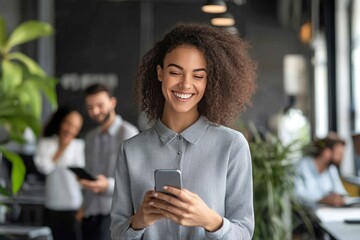 Smiling businesswoman using her phone in the office. Small business entrepreneur looking at her mobile phone and smiling while communicating with her office colleagues , ai