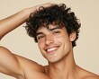 © ArtisticSnap - A smiling young man with curly hair posing confidently, showcasing a vibrant and joyful energy, perfect for lifestyle imagery.