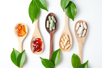 Wall Mural - wooden spoon with soft gels, Fish oil capsules, omega 3, omega 9, vitamin D, vitamin E