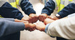 © peopleimages.com - Group, people and teamwork with fist bump in warehouse for collaboration, trust and motivation. Logistics, dropshipping and workers with gesture of support for partnership, agreement and solidarity