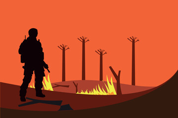 The soldier looks at the fire.