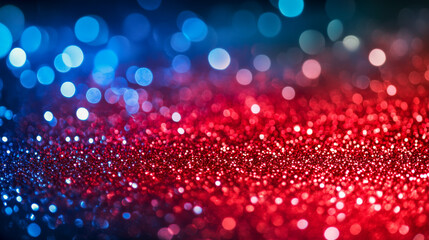 Abstract bokeh lights in vibrant red and blue tones creating a colorful, festive pattern.