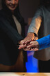 © Phimwilai - Business teamwork holding hands concept Business team joining hands Participate in business work with successful new startup projects.
